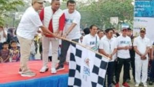 Meriahkan HUT Ke 25 BUMN, Bupati Pelalawan Lepas Jalan Sehat Bersama