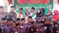 Bupati Pelalawan Hadiri Penyerahan Santunan Anak Yatim di Desa Kusuma