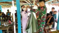 Peduli Kesehatan Anak-anak di Perbatasan Satgas Yonif 122/TS Melaksanakan Posyandu Terpadu Di Kampung Kibay Papua