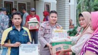 Polsek Pujud Serahkan Sembako Bantuan Bupati Rohil dan Pemkep Tanjung Medan Barat kepada Warga Terdampak Banjir 