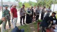 Kompi Siaga Power On Hand Polres Rohil Kawal Pemilu Ulang di TPS 01 Sei Manasib