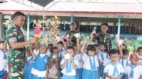 Satgas Yonif 122/TS Berpartisipasi Meriahkan HUT Ke-28 dan Wisuda Akbar TK Yagama Pir IV Papua