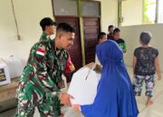 Satgas Pamtas Yonarhanud 1 Kostrad Bersama Yayasan Benih Baik Salurkan Bantuan Sembako di Wilayah Perbatasan