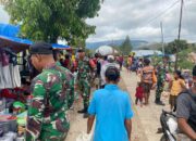 Satgas Pamtas Perkuat Keamanan di Pasar Tradisional Desa Naekake