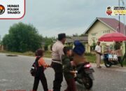 Cegah Laka Lantas, Polsek Sinaboi Laksanakan Strong Point di Sekolah
