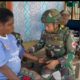 Satgas Pamtas Kewilayahan RI-PNG Yonif 763/SBA Laksanakan Yankes Door to Door