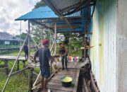 Satgas Yonif 123/Rajawali Pos Suator Bersama Masyarakat Gelar Aksi Bersih Gereja Sambut Kenaikan Isa Almasih