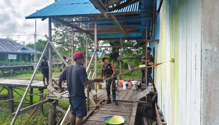 Satgas Yonif 123/Rajawali Pos Suator Bersama Masyarakat Gelar Aksi Bersih Gereja Sambut Kenaikan Isa Almasih