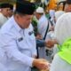 214 Jamaah Haji Kloter 10 Batam Tiba di Inhu, Wabup Hendrizal Bersama Ketua DPRD Sabtu Sinurat Sambut dengan Haru