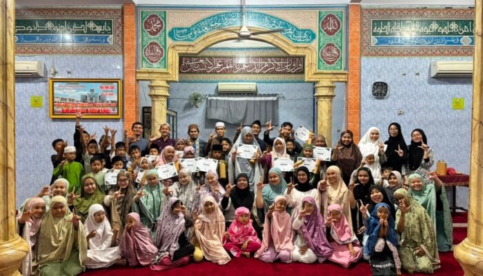Kelompok 13 KKN Universitas Abdurrab Gelar Lomba Literasi Qur’an di TPA Masjid Nurur Rahman Desa Sungai Pinang