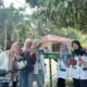 Mahasiswa KKN Universitas Abdurrab Kelompok 13 Realisasikan Pembuatan Plang Nama Jalan dan Plang RT/RW di Dusun II Desa Sungai Pinang