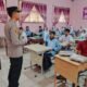 Polsek Rantau Kopar Sosialisasikan Pencegahan Karhutla dan Bagikan Masker di SMA Negeri 01 Rantau Kopar